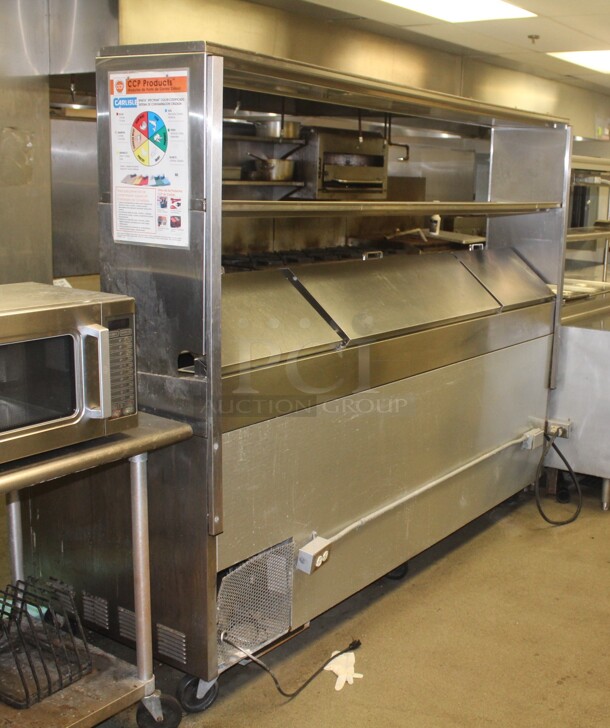AWESOME! True Model TPP-93 Commercial Stainless Steel 3 Door Pizza Prep Table On Commercial Casters With Shelf.  - Image 9 of 9