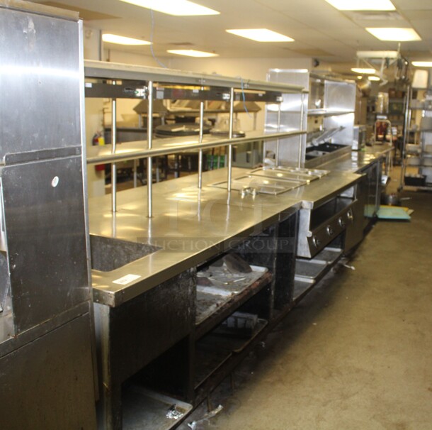 HUGE! Commercial Stainless Steel L-Shaped Food Warming/Prep Tables With Shelves. 135x122x66. Working When Closed! Buyer Must Disassemble Remove. Please See All Photos As This Is A Very Large Item.  - Image 2 of 11