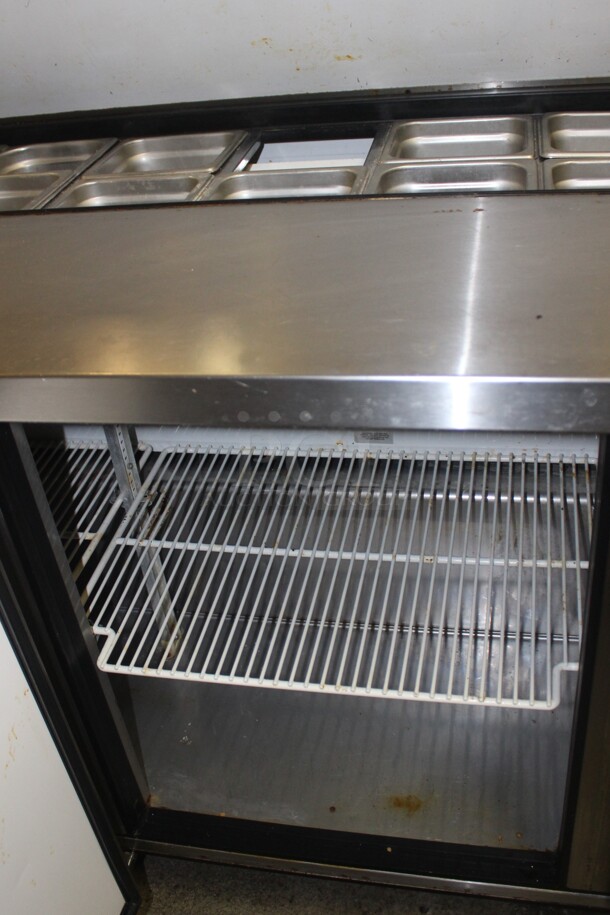 AWESOME! True Model TSSU-72-18 Commercial Stainless Steel Sandwich/Salad Prep Table On Commercial Casters With Shelves And Superior Model FD-36 Overhead Warmer. 72x31x49. 115V/60Hz. Working When Closed! Buyer Must Remove.  - Image 4 of 9