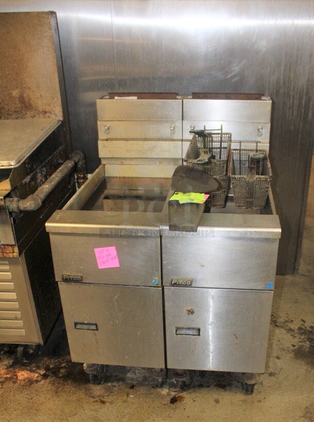 GREAT! 2 Pitco Commercial Stainless Steel Natural Gas Floor Fryers On Commercial Casters. 32x35x65. Working When Closed! Buyer Must Remove. 2X Your Bid!