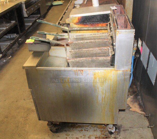 GREAT! 2 Pitco Commercial Stainless Steel Natural Gas Floor Fryers On Commercial Casters. 32x35x65. Working When Closed! Buyer Must Remove. 2X Your Bid! - Image 4 of 5