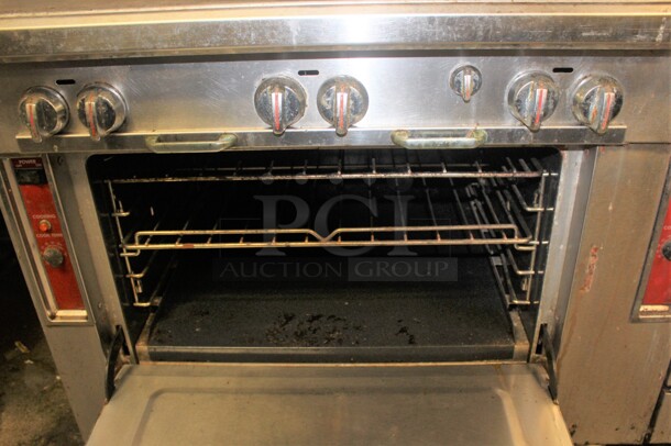 TERRIFIC! Blodgett Commercial Stainless Steel Natural Gas 6 Burner Range With Oven. 36x39x73. Working When Closed! Buyer Must Remove.  - Image 2 of 3