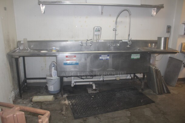 GREAT FIND! Commercial Stainless Steel Sink With Double Drainboards, Sprayer And Faucet. 138x22x40. Buyer Must Remove. 