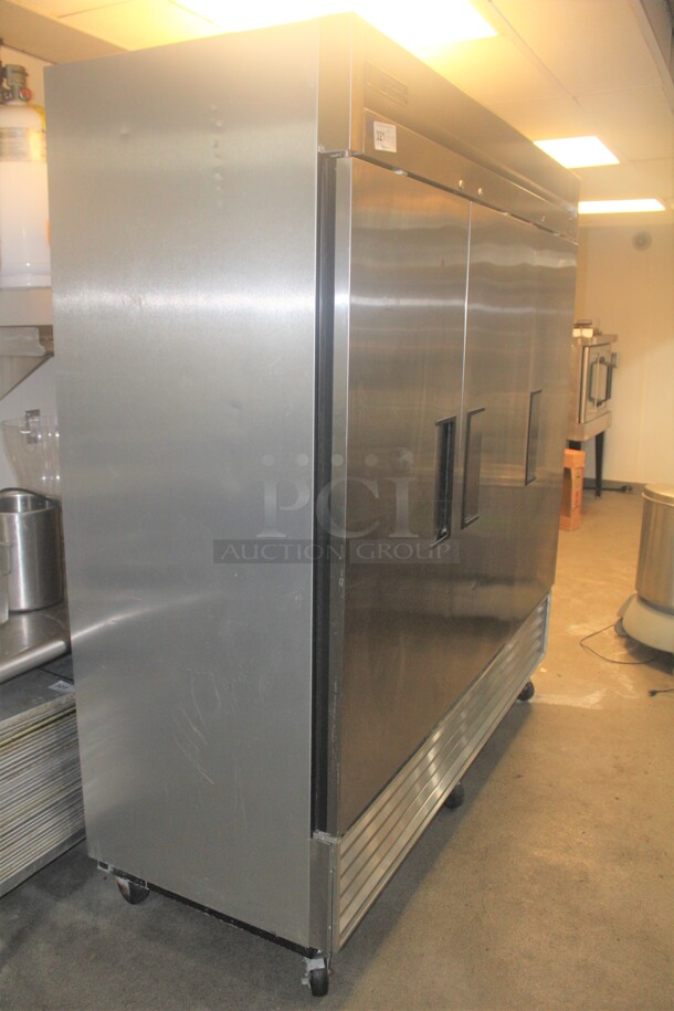 FANTASTIC! True Model T-72 Commercial Stainless Steel Triple Door Reach In Refrigerator/Cooler On Commercial Casters. 78x30x84. 115V/60Hz. Working When Closed! Buyer Must Remove. 