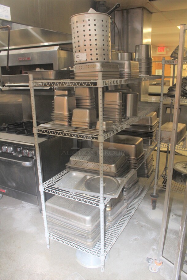 GREAT! ALL ONE MONEY! Commercial Metro Rack And 4 Shelves Of Assorted Stainless Steel Inserts.  - Image 1 of 6