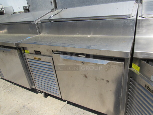 One Traulsen 1 Door Refrigerated Pizza Prep Table On Casters, With 1 Rack. Model# TS048HT. 115 Volt. 48X35X49. $9504.00. WORKING! - Image 4 of 4