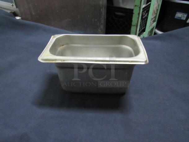 One 1/9 Size 4 Inch Deep Hotel Pan. 