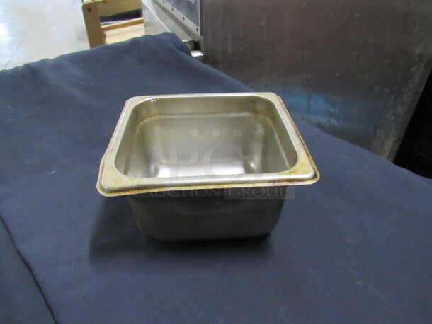 1/6 Size 4 Inch Deep Hotel Pan. 4XBID.