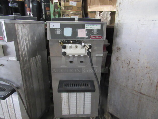 One Sani Serve Soft Serve Ice Cream Machine On Casters. Model# A5271P. 208-230 Volt. 1 Phase. 24X27X59. Working When Removed. $19,178.02.