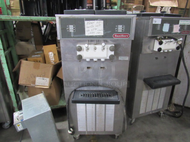 ***THIS MACHINE WAS USED FOR PARTS ONLY! NOT WORKING! One Sani Serve Soft Serve Ice Cream Machine On Casters. Model# A5271P. 208-230 Volt. 1 Phase. 24X27X59.  $19,178.02. - Image 1 of 3