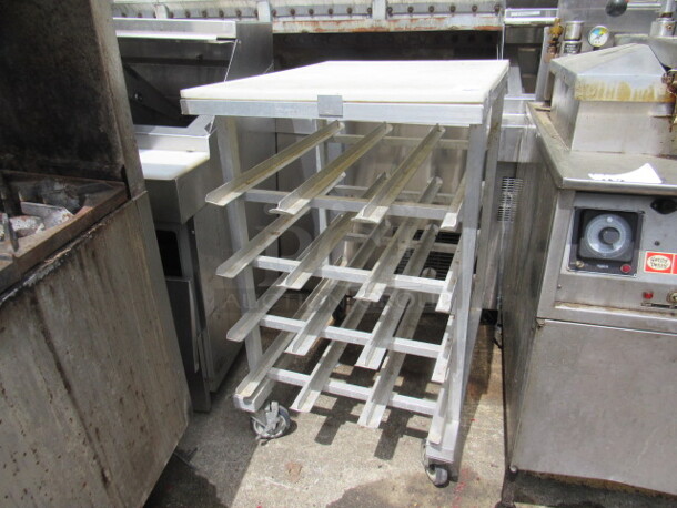 One 10lb Can Rack On Casters With Cutting Board Top. NICE! 25.5X34.5X42 - Image 1 of 1