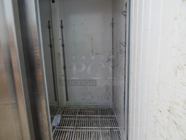 One Stainless Serv Ware 2 Door Refrigerator, With 2 Racks On Casters. WORKING NOT COLD! Model# RR-2. 115 Volt. 53.5X32.5X83 - Image 2 of 2