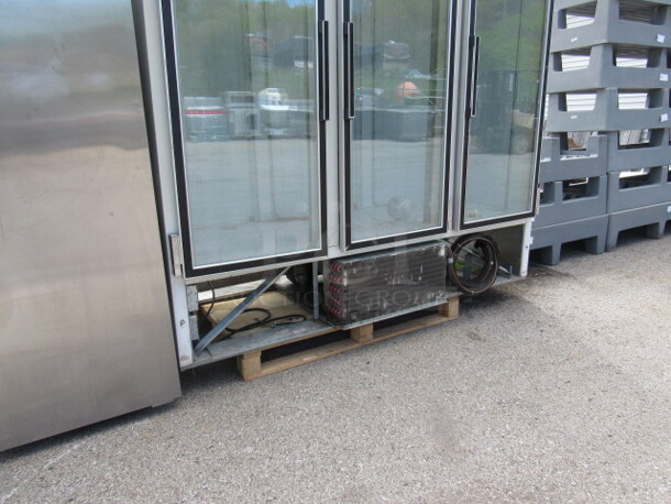One 3 Door Glass Display Freezer. 115 Volt. Model# CF74-SW. 76X32X84. Missing Bottom Panel Not Working. - Image 3 of 4