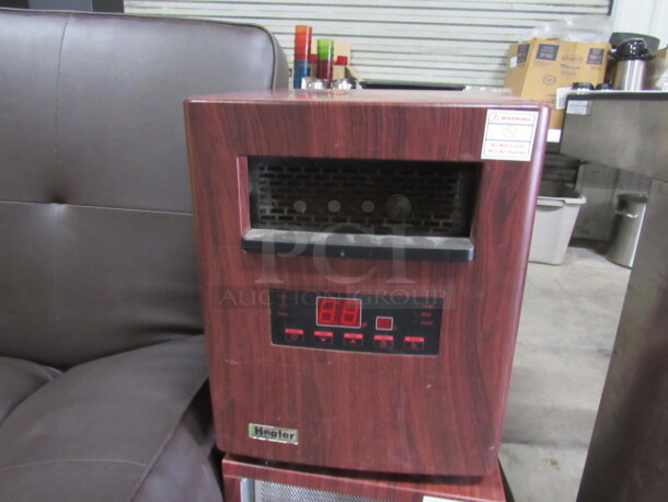 One iHeater On Casters. Model# IH1500. 120 Volt. 13X15X18 - Image 1 of 1