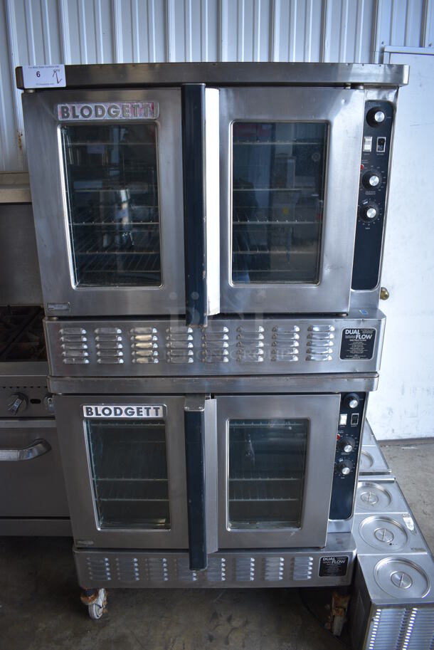 2 FANTASTIC! Blodgett Stainless Steel Commercial Natural Gas Powered Full Size Convection Oven w/ View Through Doors, Metal Oven Racks and Thermostatic Controls on Commercial Casters. 38x39x73. 2 Times Your Bid!
