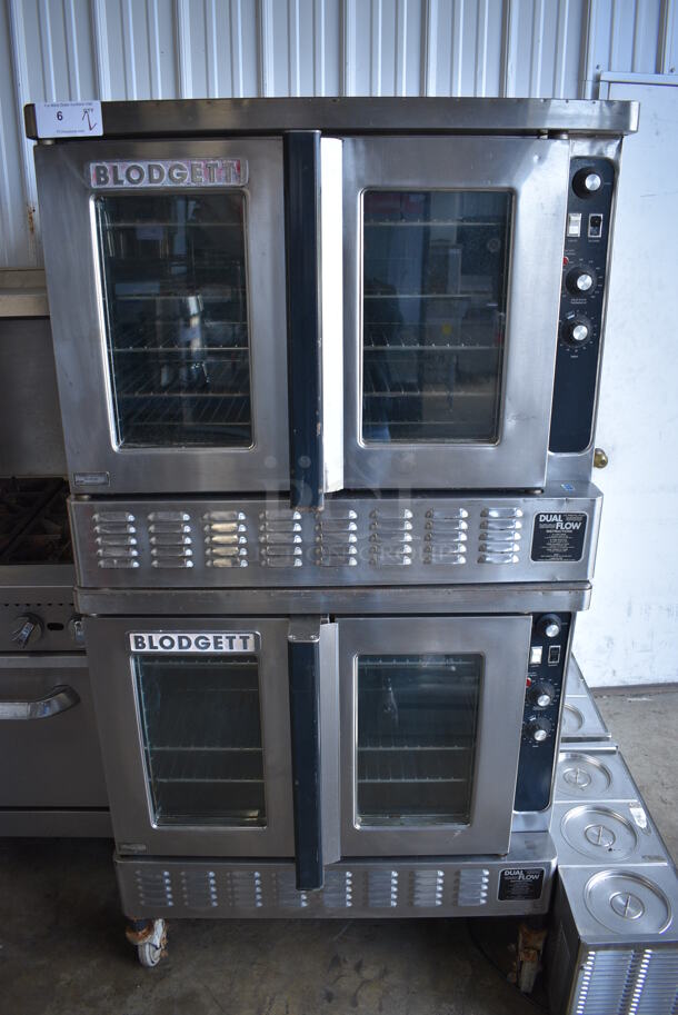 2 FANTASTIC! Blodgett Stainless Steel Commercial Natural Gas Powered Full Size Convection Oven w/ View Through Doors, Metal Oven Racks and Thermostatic Controls on Commercial Casters. 38x39x73. 2 Times Your Bid! - Image 1 of 11