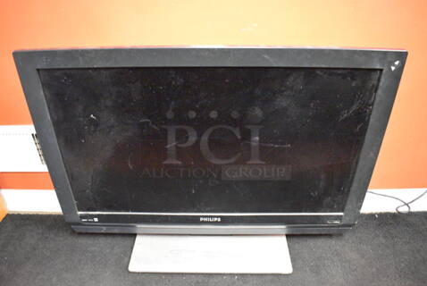 Philips Model 37PFL5322D/37 37" Television. 100-240 Volts, 1 Phase. Buyer Must Pick Up - We Will Not Ship This Item. Tested and Powers On But Screen Stays Black.