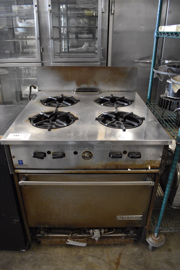 Garland Stainless Steel Commercial Propane Gas Powered 4 Burner Range w/ Oven and Backsplash. 30x32x43