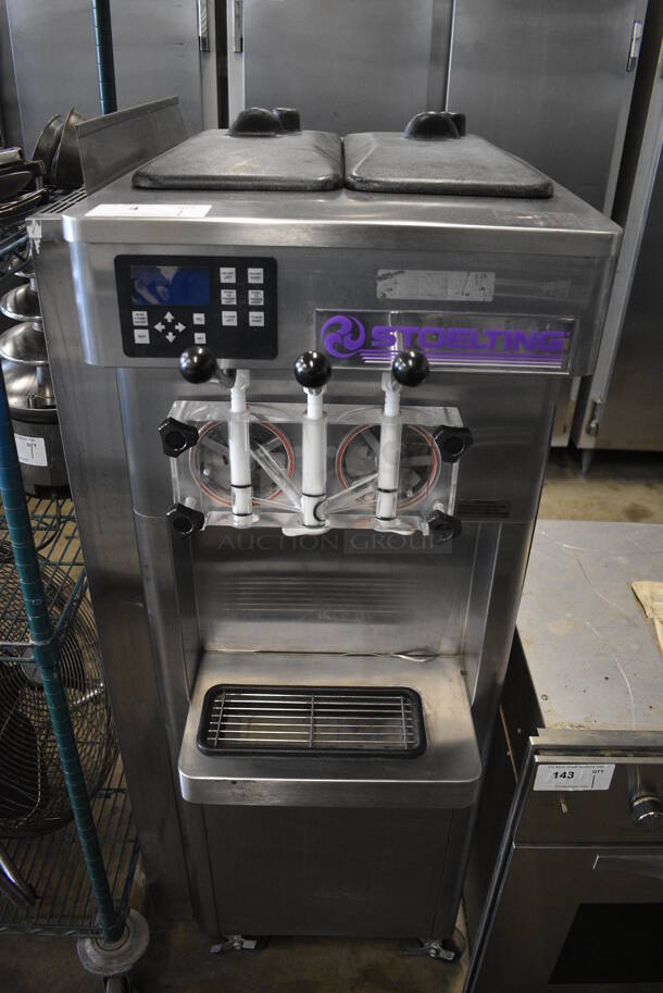 BEAUTIFUL! 2011 Stoelting Model F231-38I2 Stainless Steel Commercial Floor Style Air Cooled 2 Flavor w/ Twist Soft Serve Ice Cream Machine on Commercial Casters. 208-240 Volts, 1 Phase. 22x34x55 - Image 1 of 11