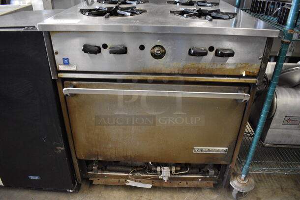 Garland Stainless Steel Commercial Propane Gas Powered 4 Burner Range w/ Oven and Backsplash. 30x32x43 - Image 4 of 10