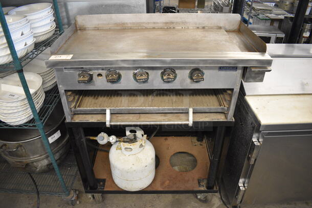 GREAT! Rankin Delux Model GB-36-C Stainless Steel Commercial Propane Gas Powered Flat Top Griddle on Stand w/ Commercial Casters. 40x25x50 - Image 1 of 10