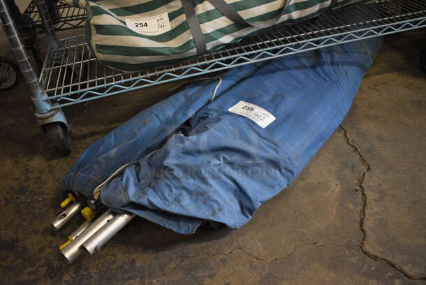 ALL ONE MONEY! Lot of 2 Blue Bags w/ Poles!   - Image 1 of 3