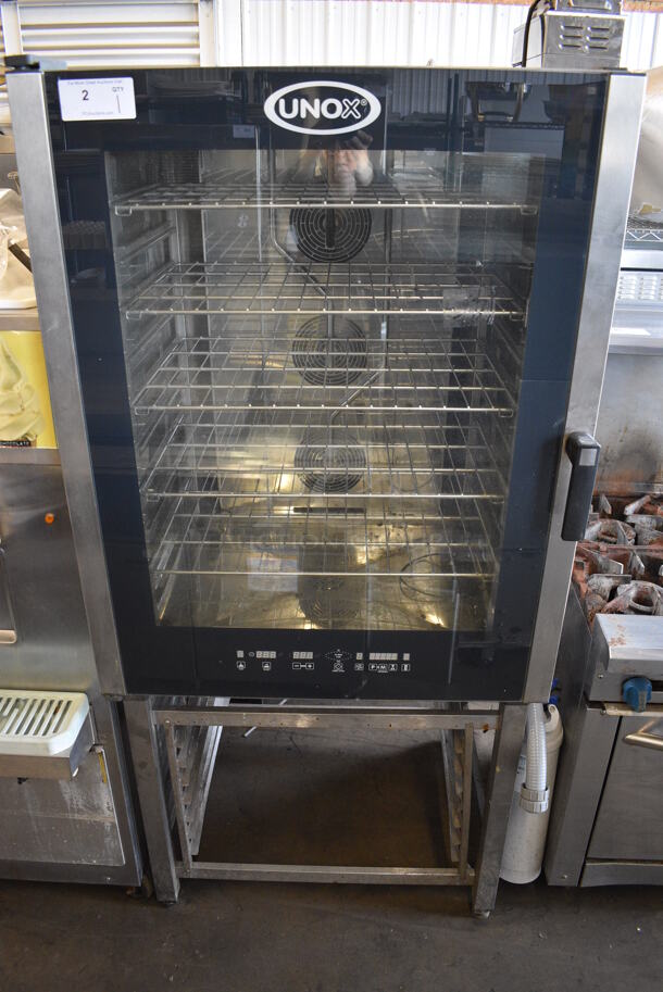 GORGEOUS! 2013 Cadco Unox Model XAV805P-208 Stainless Steel Commercial Electric Powered Convection Oven w/ View Through Door, Metal Oven Racks and Lower Pan Rack. 208 Volts, 3 Phase. 34x35x73