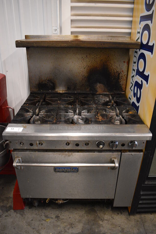 WOW! Imperial Stainless Steel Commercial Natural Gas Powered 6 Burner Range w/ Oven, Backsplash and Overshelf. 36x32x57 - Image 1 of 7