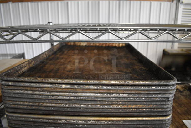 13 Metal Perforated Full Size Baking Pans. 18x26x1. 13 Times Your Bid!
