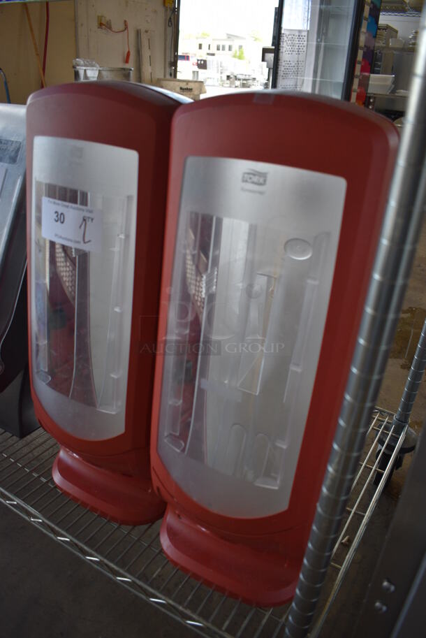 2 Tork Red and Clear Poly Countertop Napkin Dispensers. 9x9x24.5. 2 Times Your Bid! - Image 3 of 4