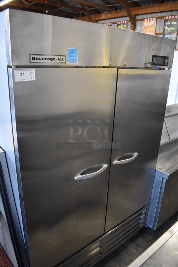GREAT! Beverage Air Model KF48-1AS ENERGY STAR Stainless Steel Commercial 2 Door Reach In Freezer w/ Poly Coated Racks on Commercial Casters. 115 Volts, 1 Phase. 54.5x32x84. Tested and Powers On But Does Not Get Cold - Image 1 of 7