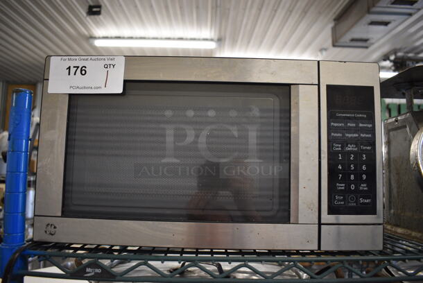 GE Model JES0736SM1SS Chrome Finish Countertop Microwave. 18x11.5x10 - Image 1 of 4