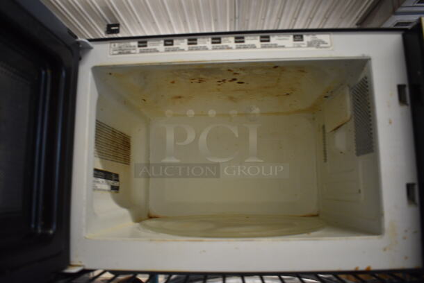 GE Model JES0736SM1SS Chrome Finish Countertop Microwave. 18x11.5x10 - Image 3 of 4