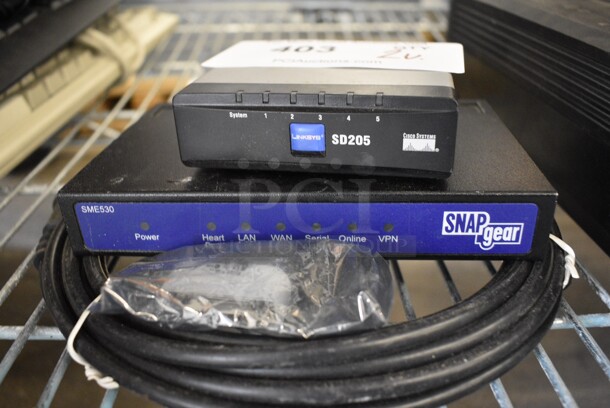 2 Various Electronic Unit; SD205 and Snapgear SME530. 6.5x4.5x1, 3.5x3.5x1. 2 Times Your Bid!