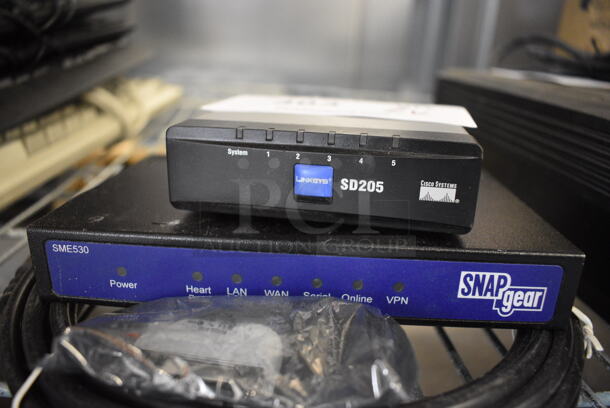 2 Various Electronic Unit; SD205 and Snapgear SME530. 6.5x4.5x1, 3.5x3.5x1. 2 Times Your Bid! - Image 2 of 2
