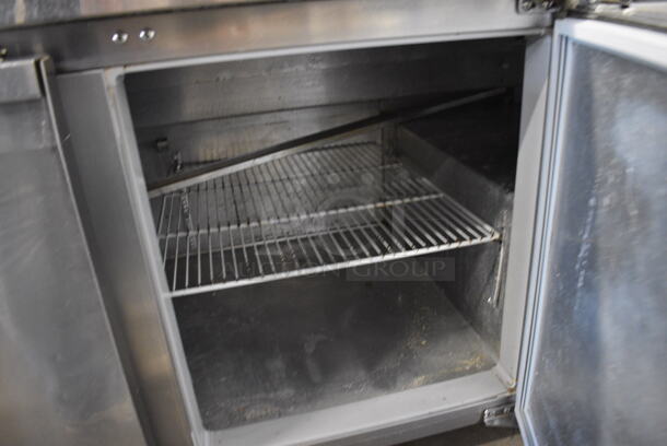 NICE! Continental Model CPA68 Stainless Steel Commercial Pizza Prep Table on Commercial Casters. 115 Volts, 1 Phase. 68x35x40. Tested and Powers On But Does Not Get Cold - Image 5 of 8