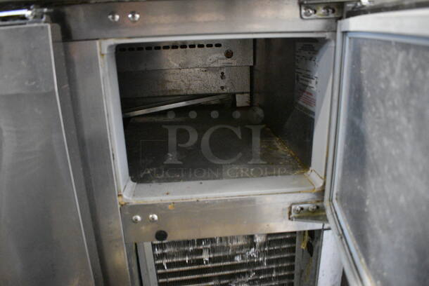 NICE! Continental Model CPA68 Stainless Steel Commercial Pizza Prep Table on Commercial Casters. 115 Volts, 1 Phase. 68x35x40. Tested and Powers On But Does Not Get Cold - Image 6 of 8