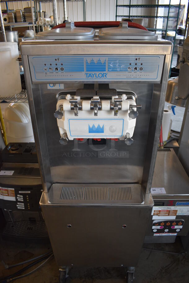 SWEET! 2012 Taylor Model 794-33 Stainless Steel Commercial Floor Style Water Cooled 2 Flavor w/ Twist Soft Serve Ice Cream Machine on Commercial Casters. 208-230 Volts, 3 Phase. 20x36x60