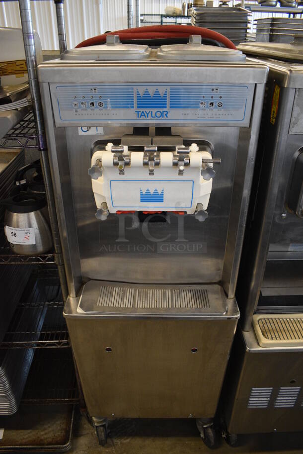 SWEET! 2012 Taylor Model 794-33 Stainless Steel Commercial Floor Style Water Cooled 2 Flavor w/ Twist Soft Serve Ice Cream Machine on Commercial Casters. 208-230 Volts, 3 Phase. 20x36x60