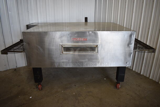 FANTASTIC! Blodgett Model MG-32 Stainless Steel Commercial Natural Gas Powered Conveyor Pizza Oven on Commercial Casters. 150,000 BTU. 106x53x44.5
