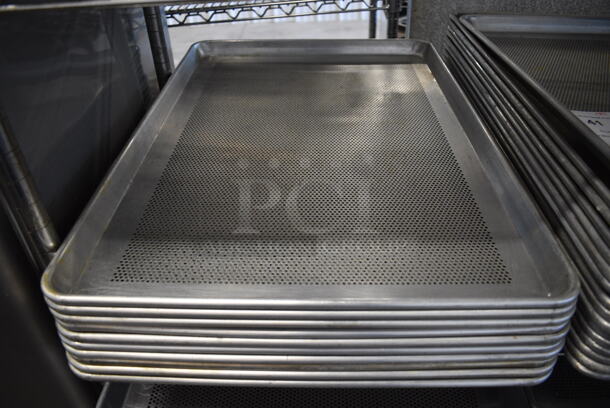 7 Metal Perforated Full Size Baking Pans. 18x26x1. 7 Times Your Bid!