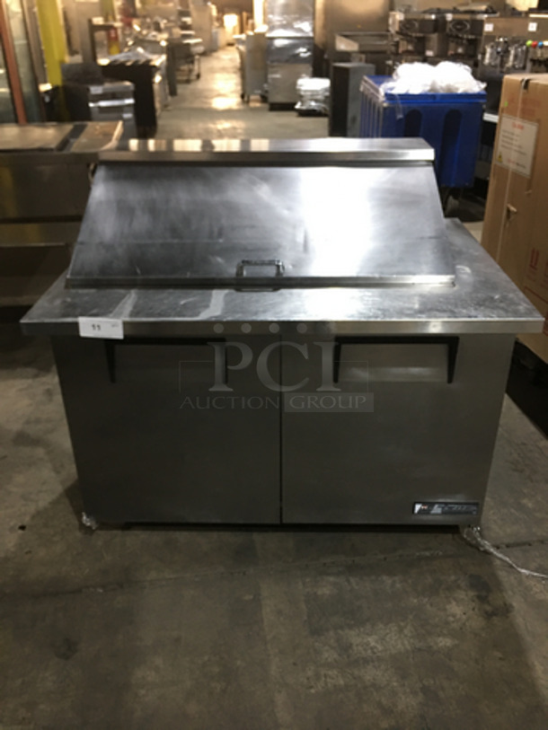 True Commercial Refrigerated Sandwich/Salad Prep Table! With 2 Doors Underneath Storage Space! With Poly Coated Racks! All Stainless Steel! Model TSSU4818MB Serial 5272463! 115V 1Phase! On Commercial Casters!