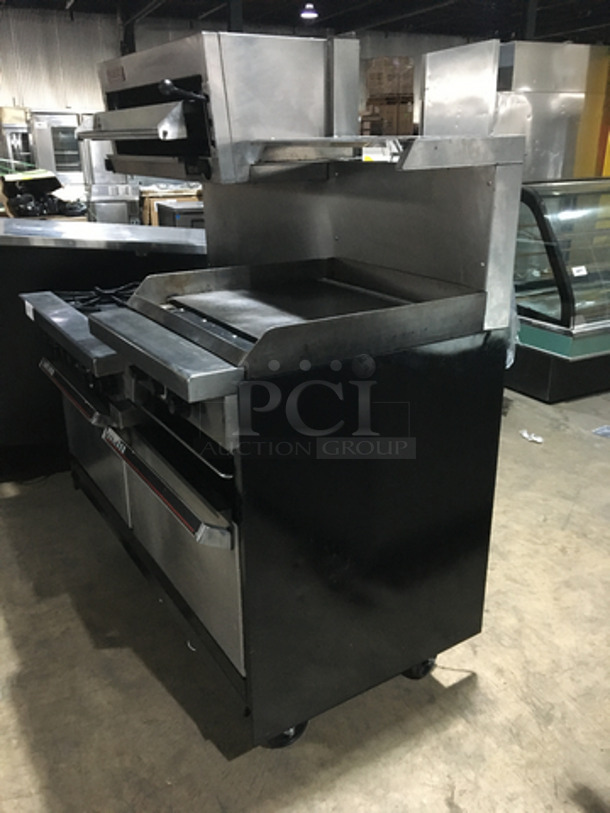 AMAZING! Garland Commercial 6 Burner Stove! With 2 Full Size Ovens Underneath! With Right Side Flat Griddle/Cheese Melter Combo! With Overhead Salamander! All Stainless Steel! On Casters! - Image 3 of 11