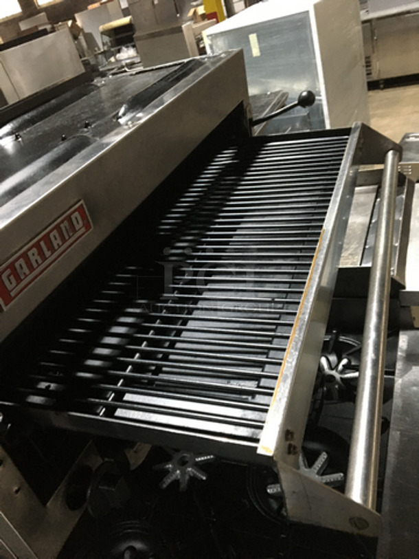 AMAZING! Garland Commercial 6 Burner Stove! With 2 Full Size Ovens Underneath! With Right Side Flat Griddle/Cheese Melter Combo! With Overhead Salamander! All Stainless Steel! On Casters! - Image 10 of 11