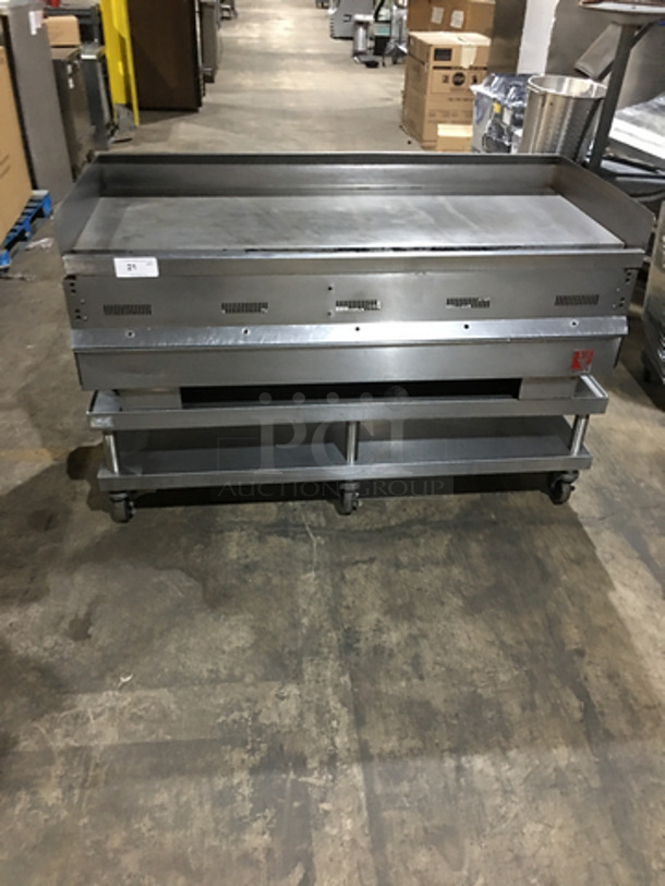WOW! Wolf Commercial Heavy Duty Natural Gas Powered Flat Griddle! With Back & Side Splashes! With Underneath Storage Space! All Stainless Steel! On Casters!