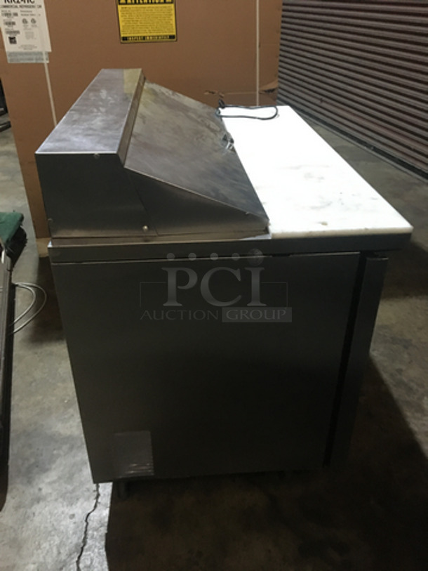 True Commercial Refrigerated Sandwich Prep Table! With 2 Door Underneath Storage Space! All Stainless Steel! Model TSSU4812 Serial 13941123! 115V 1Phase! On Commercial Casters!
 - Image 3 of 11