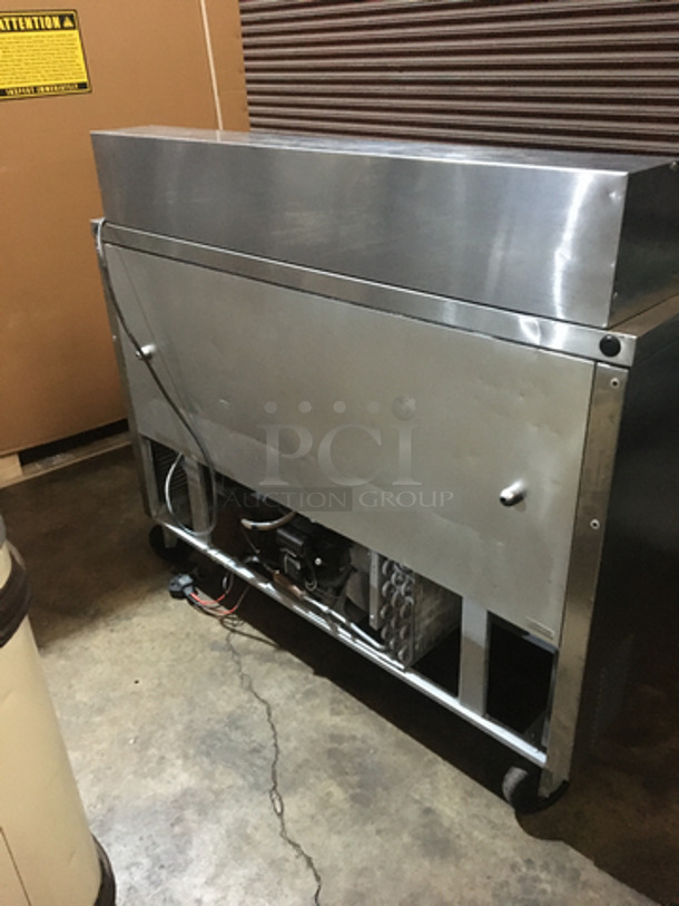 True Commercial Refrigerated Sandwich Prep Table! With 2 Door Underneath Storage Space! All Stainless Steel! Model TSSU4812 Serial 13941123! 115V 1Phase! On Commercial Casters!
 - Image 4 of 11
