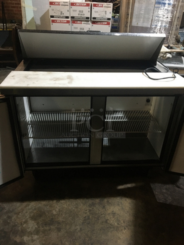 True Commercial Refrigerated Sandwich Prep Table! With 2 Door Underneath Storage Space! All Stainless Steel! Model TSSU4812 Serial 13941123! 115V 1Phase! On Commercial Casters!
 - Image 5 of 11