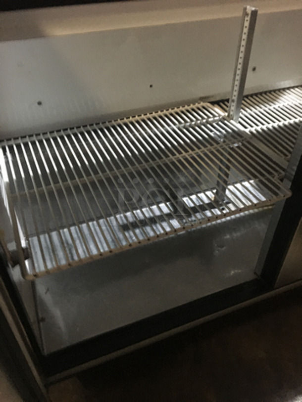 True Commercial Refrigerated Sandwich Prep Table! With 2 Door Underneath Storage Space! All Stainless Steel! Model TSSU4812 Serial 13941123! 115V 1Phase! On Commercial Casters!
 - Image 6 of 11