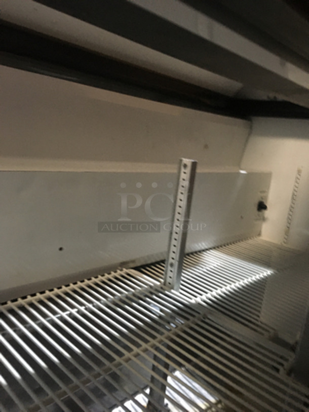True Commercial Refrigerated Sandwich Prep Table! With 2 Door Underneath Storage Space! All Stainless Steel! Model TSSU4812 Serial 13941123! 115V 1Phase! On Commercial Casters!
 - Image 7 of 11